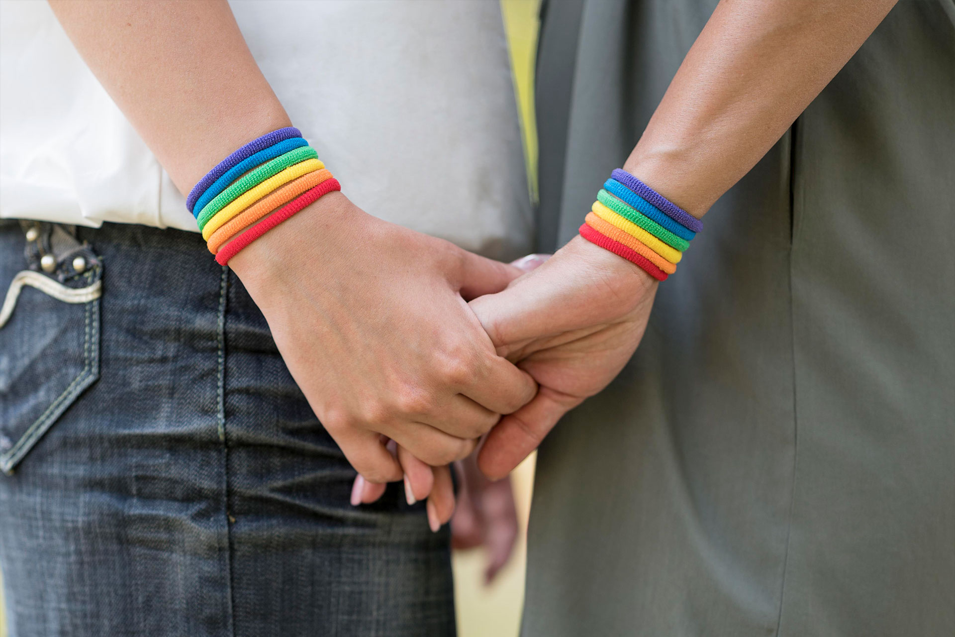 two women holding hands